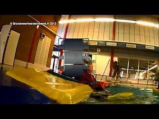 Black and Red Viking Drysuit Divers Suit up and Train in Pool