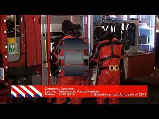 Hot Wet Black and Red Rubber Viking Drysuits at Night