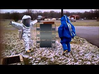 Firefighters mucking around in Blue and Silver Hazmat Suits