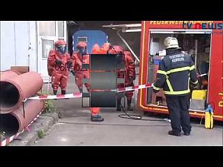 Red Hazmat Suits with slo mo Decon