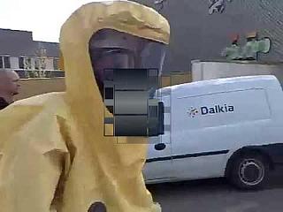 Two Yellow Hazmat Suited Guys Walking