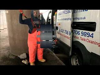 Orange 66N Waterproofs Concrete Spraying from The Motorway
