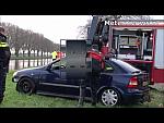 Drysuit Divers in Car Rescue in Slo Mo Half Suited Hunk