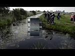 Black and Red Rubber Viking Drysuit in Horse Rescue