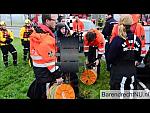 Black and Red Rubber Drysuit Viking Divers prepare to help Car Rescue