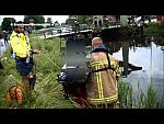 Rubber Drysuit Divers Training in Water