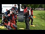 Gang of Black and Red Viking Rubber Drysuit Divers Suiting Up