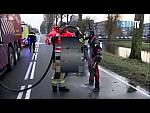 Black and Red Rubber Viking Drysuit in Car Rescue inc hose down