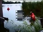 Red Drysuit Rescue Workers inc slo mo hose down