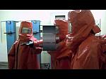 Training in Red Hazmat Suits