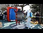 Three Red Hazmat Suit Guys inc nice Decon and Suit Scrubbing slo mo throughout