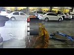 Idiot in waterproof suit gets surprise nutshot!